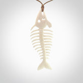 Hand carved bone fish skeleton pendant. Hand made bone fish necklace. Fish themed jewellery. Ocean themed pendant. One only necklace provided with adjustable cord and free delivery.